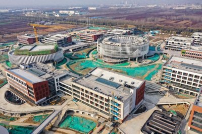 ​山东大学龙山校区，山大实验学校14栋建筑宛如花瓣般排列